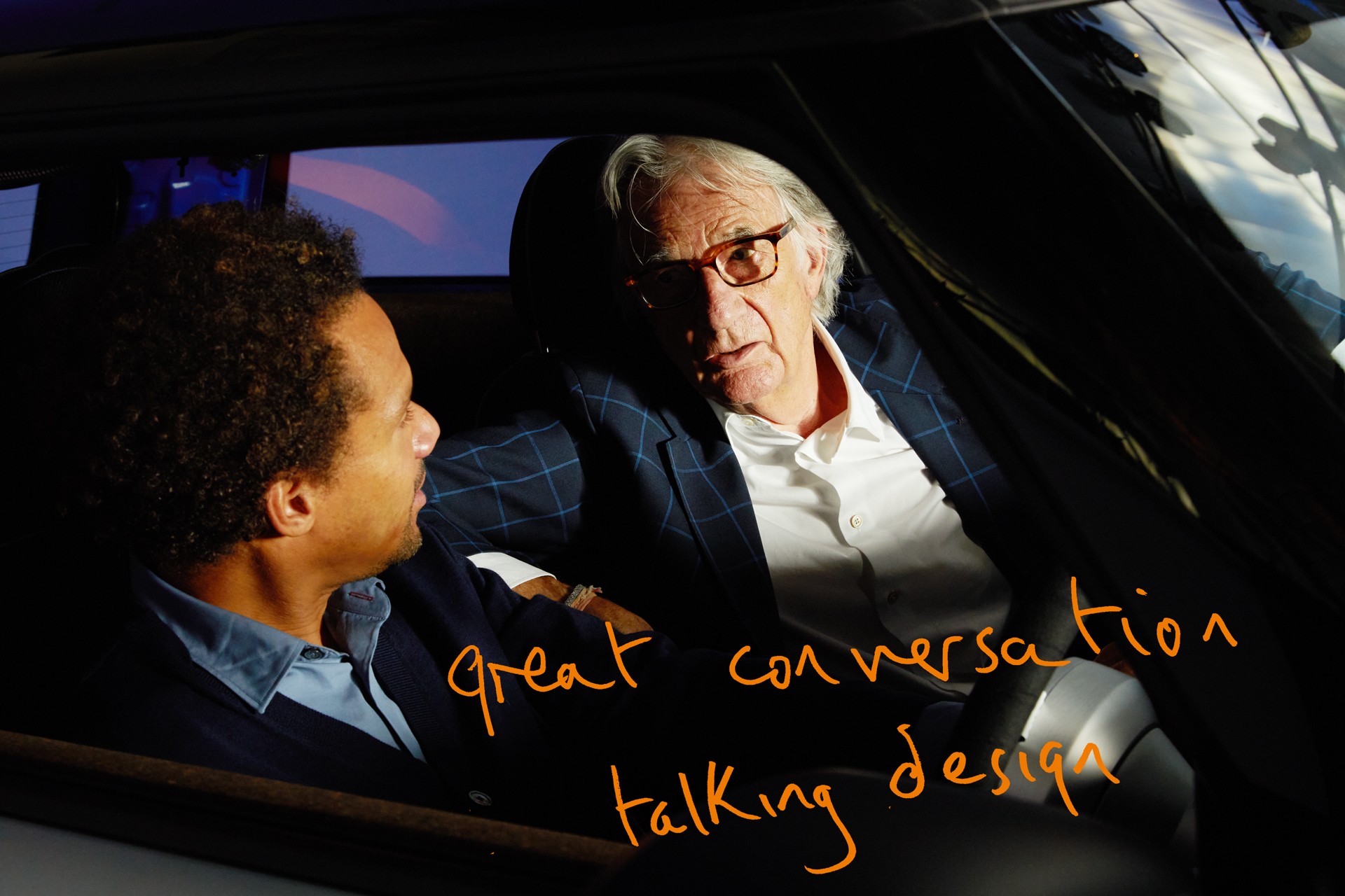 MINI chief designer Oliver Heilmer and fashion designer Paul Smith are having a conversation in the MINI Strip.